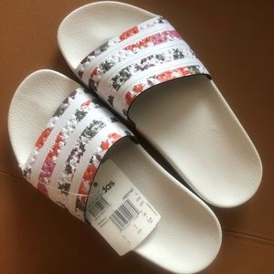 Brand new Adidas slides with flower pattern. Size 6 women’s, never worn.